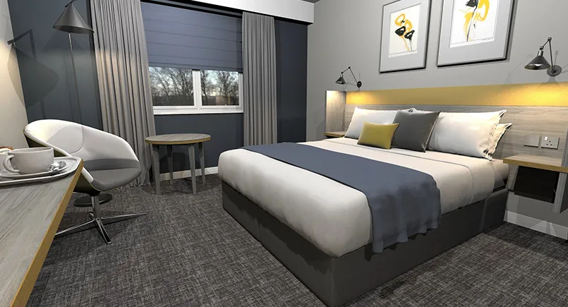 Finn hotel bedroom design with yellow accents