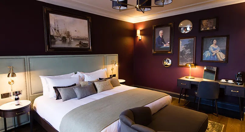 Teal velvet headboard with studding at Avon Gorge Hotel