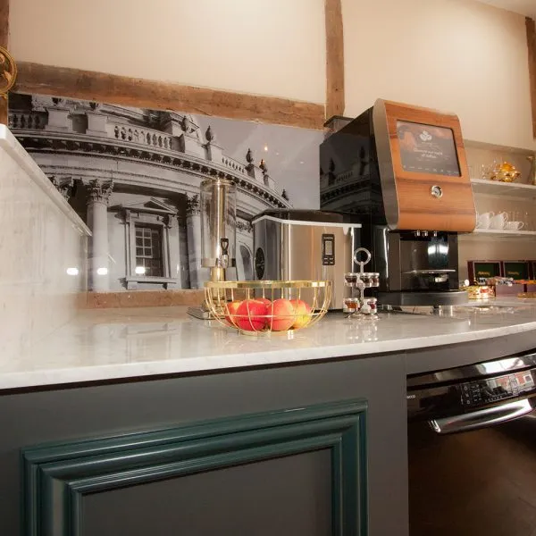 bespoke cupboards in black and white coffee station with fielded panels and marble top