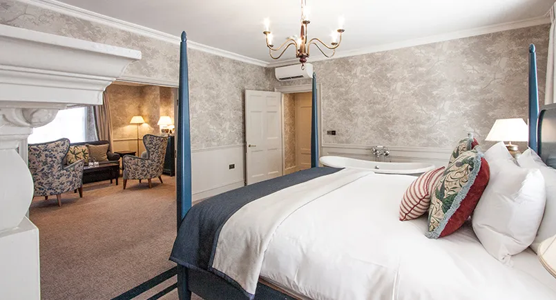Blue Wooden Four Poster Hotel Bed